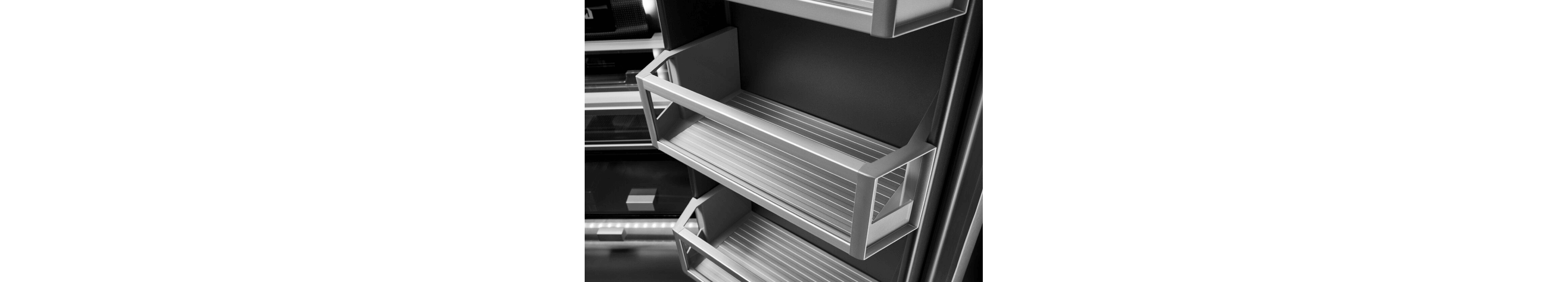 The glass and metal shelves in a JennAir® freestanding refrigerator.