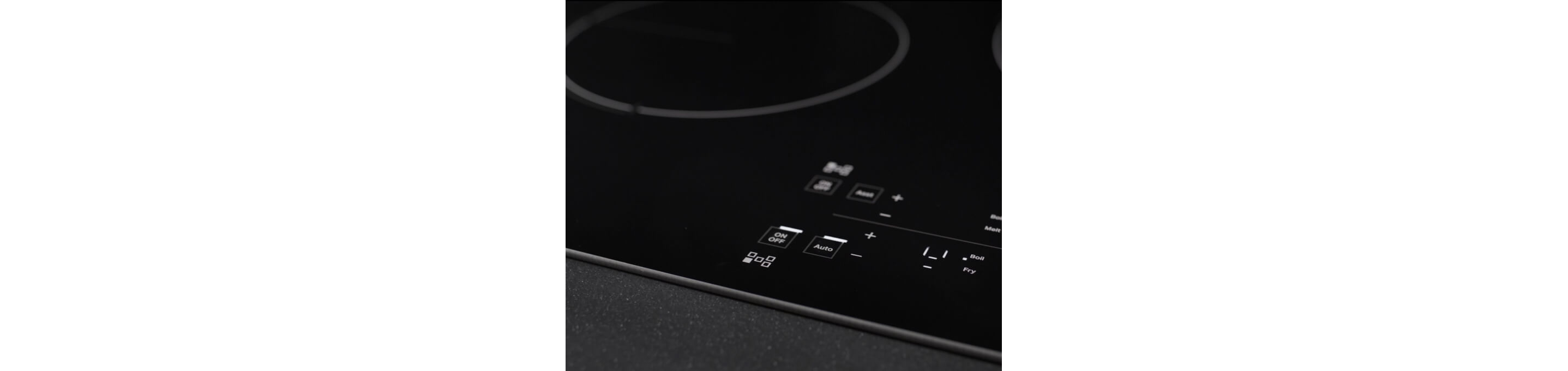 Closeup of control panel and one element on an Induction Cooktop.