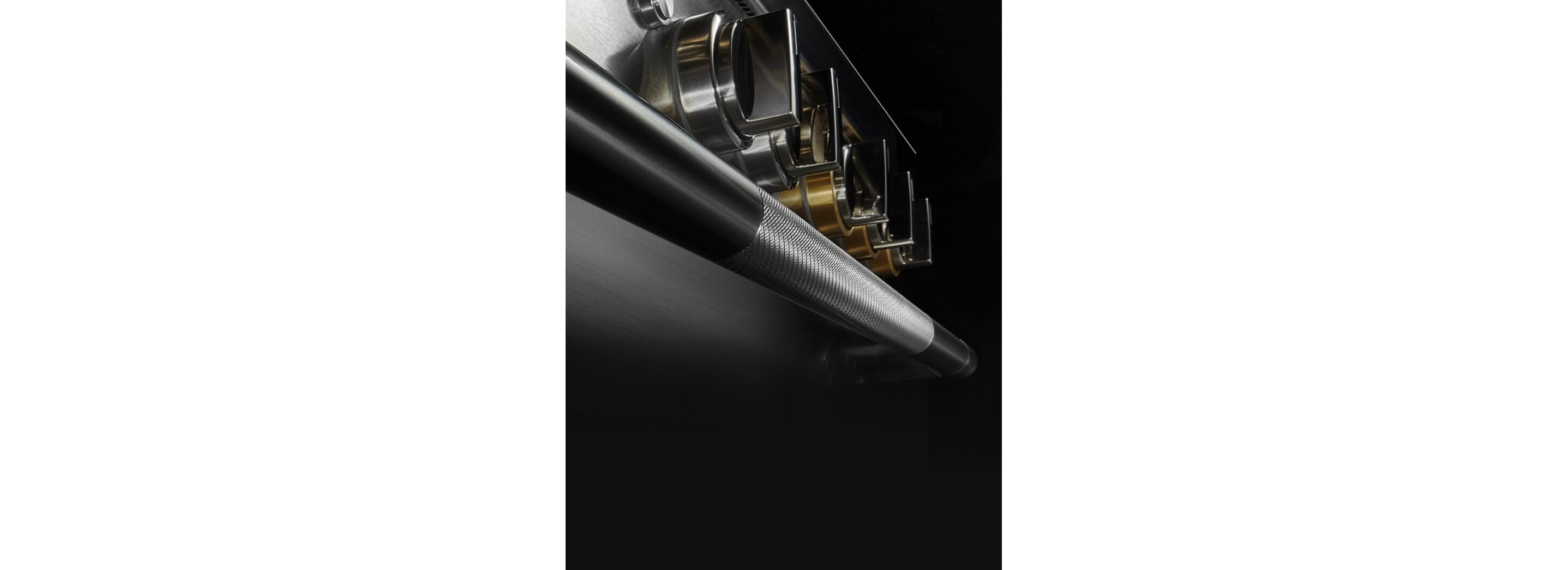 A closeup of the knurling on the handle of a RISE™ Induction Range.