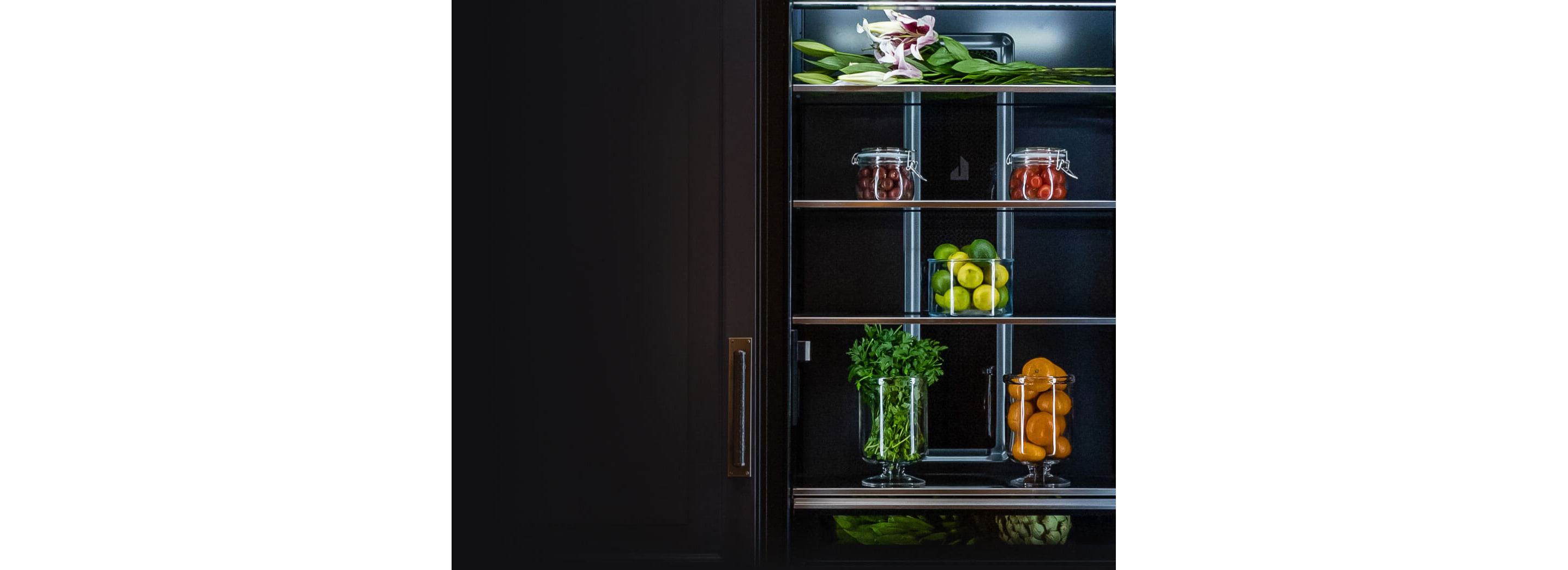 A refrigerator filled with vibrant fruits and vegetables.