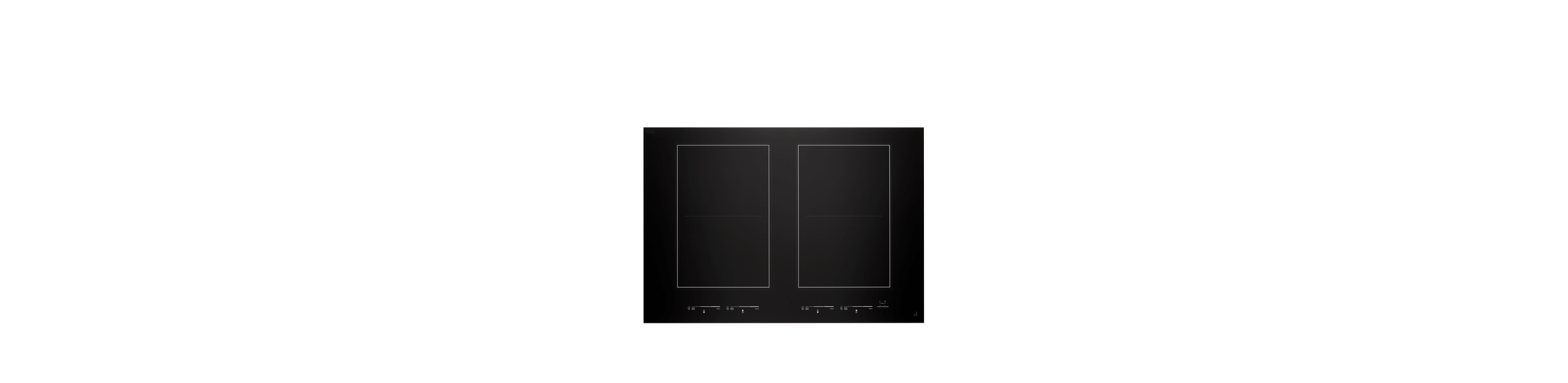A JennAir® Oblivion Glass Induction Cooktop.