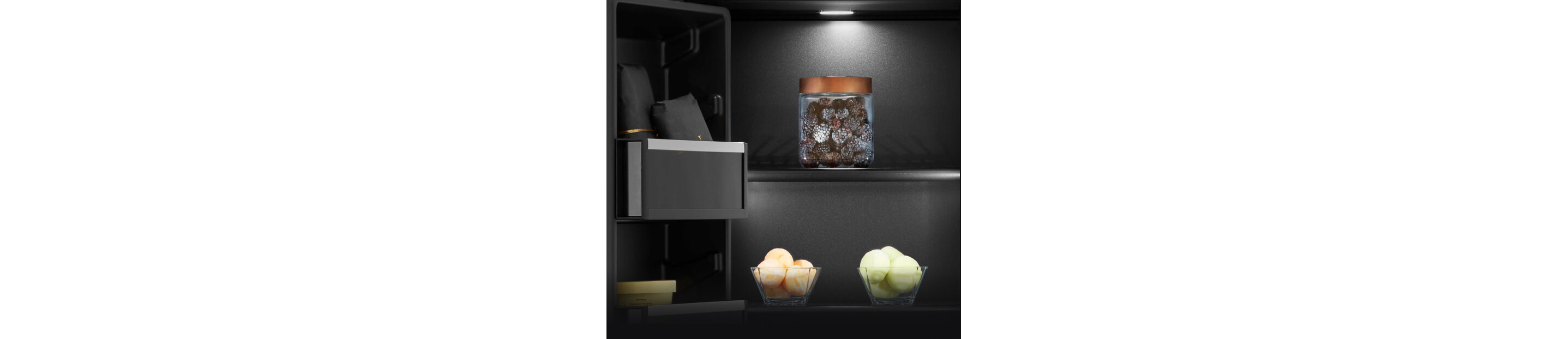 A close up on the shelves and door bins of an Obsidian interior refrigerator.