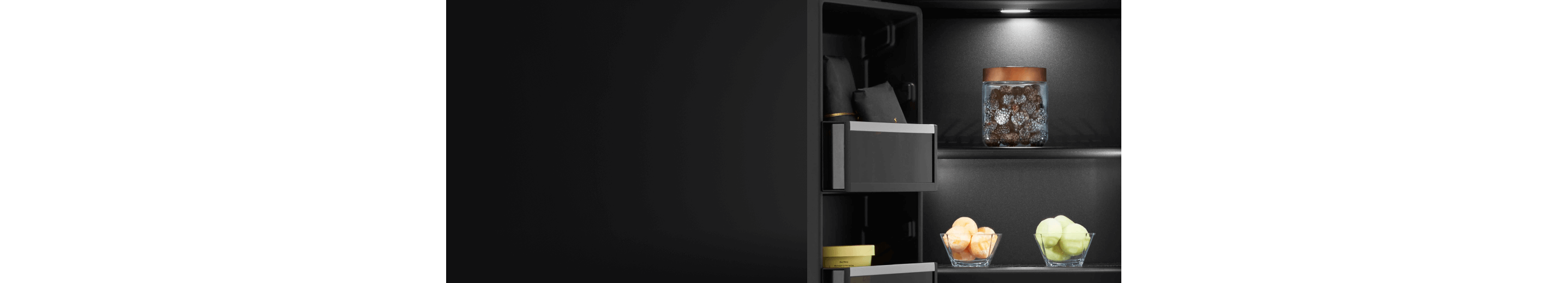 A close up on the shelves and door bins of an Obsidian interior refrigerator.