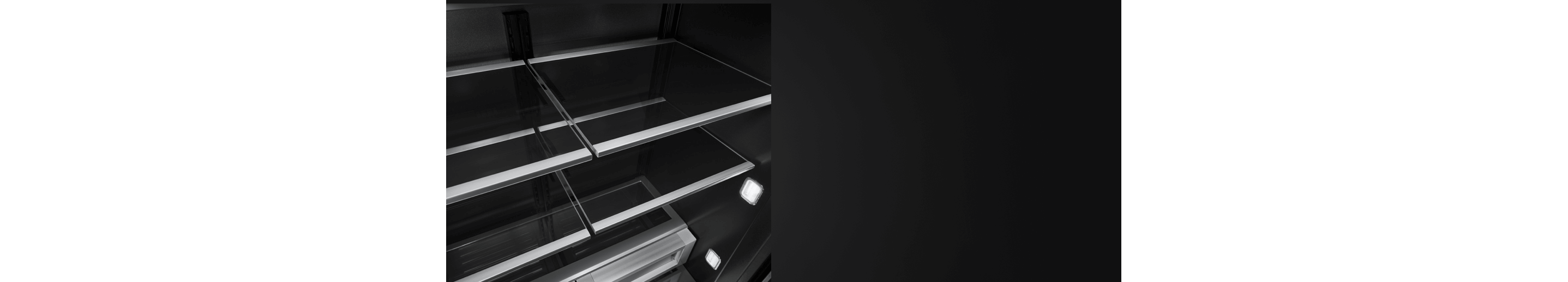 The glass and metal shelves in a JennAir® built-in refrigerator.