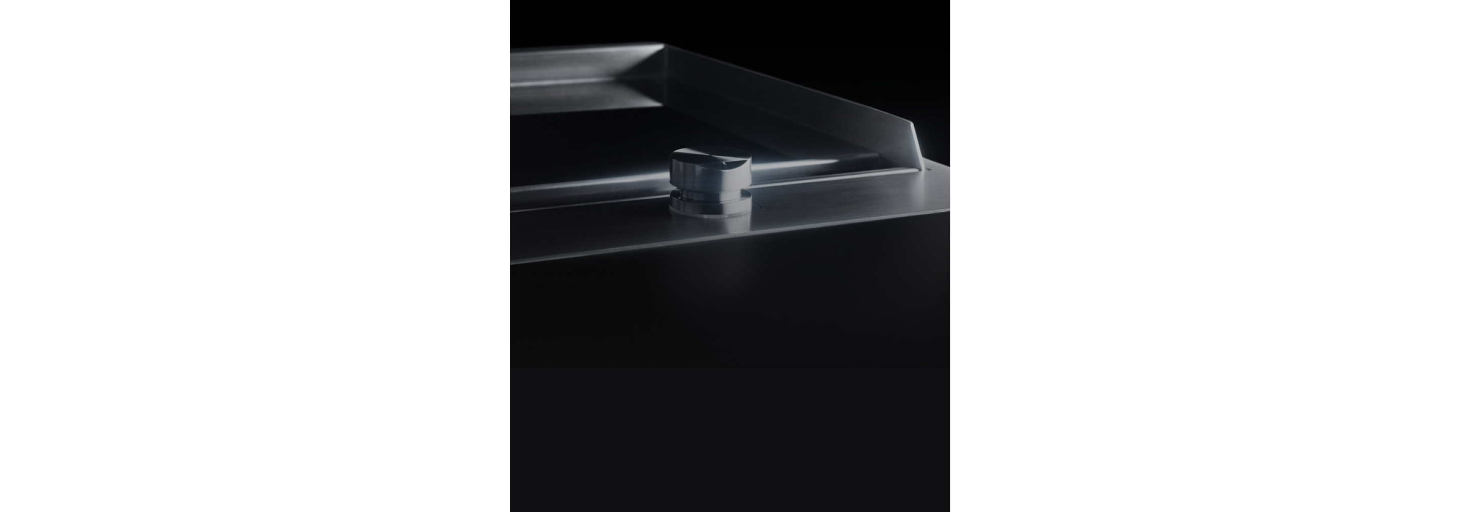 The slick chrome-infused surface of the griddle.
