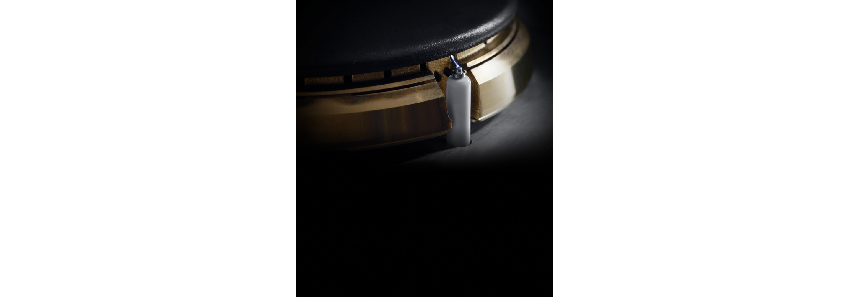 The ignition point on a brass burner.