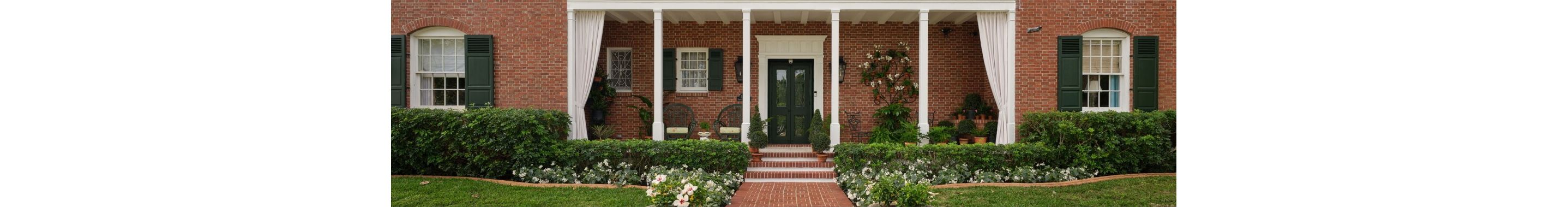 The exterior of a brick home.