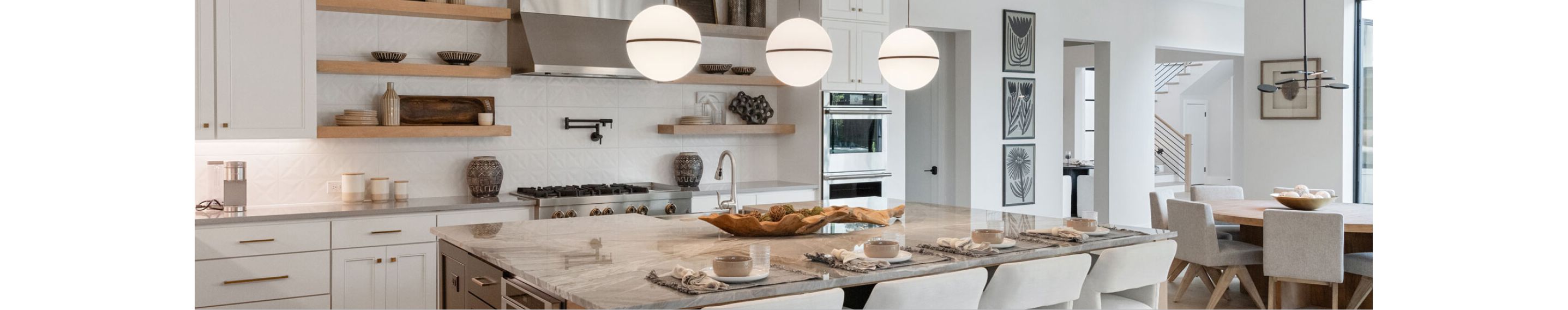 A bright, modern kitchen, outfitted with JennAir® appliances.
