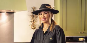Designer Nikki Chu in a JennAir kitchen.