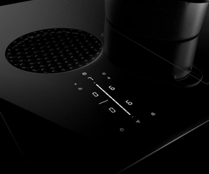 The controls and vent of the downdraft cooktop.