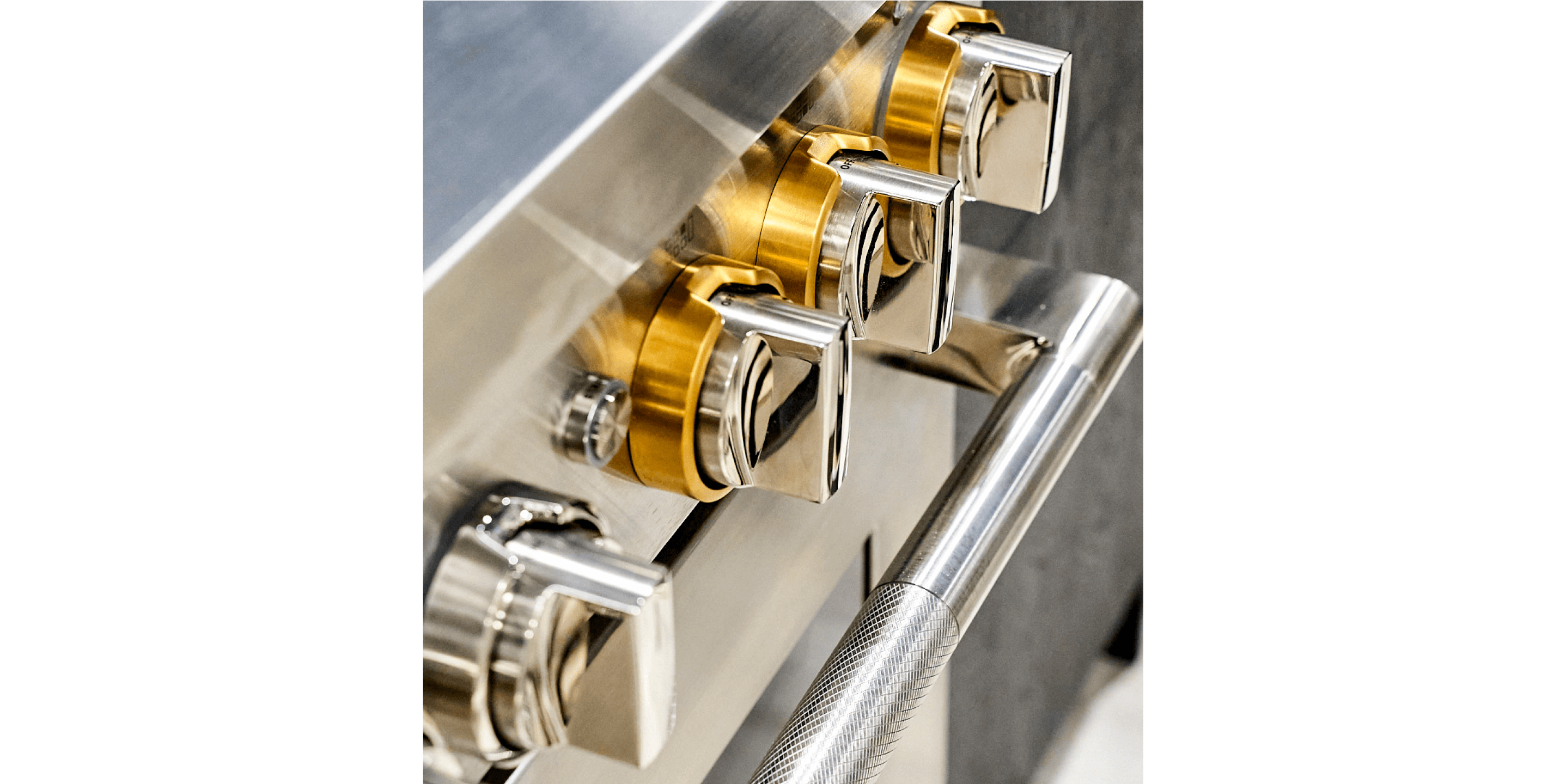 A close up of the halo-effect knobs on the new JennAir® 48-inch induction professional style range.