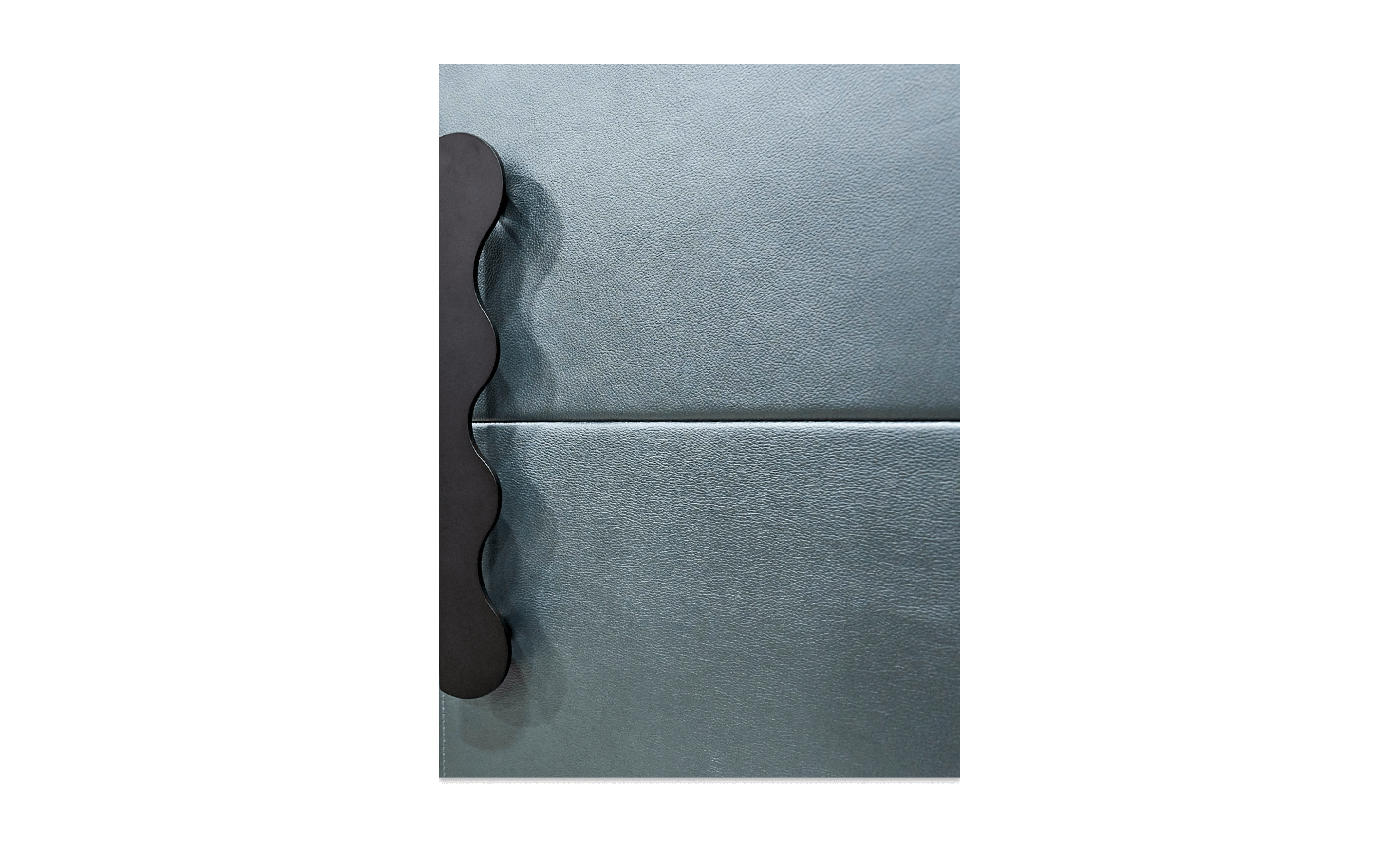A close up of the texture of the new limited edition leather Cuts panel, Mystic, fitted with a custom handle in black.