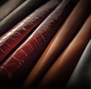 A variety of folded leather samples.