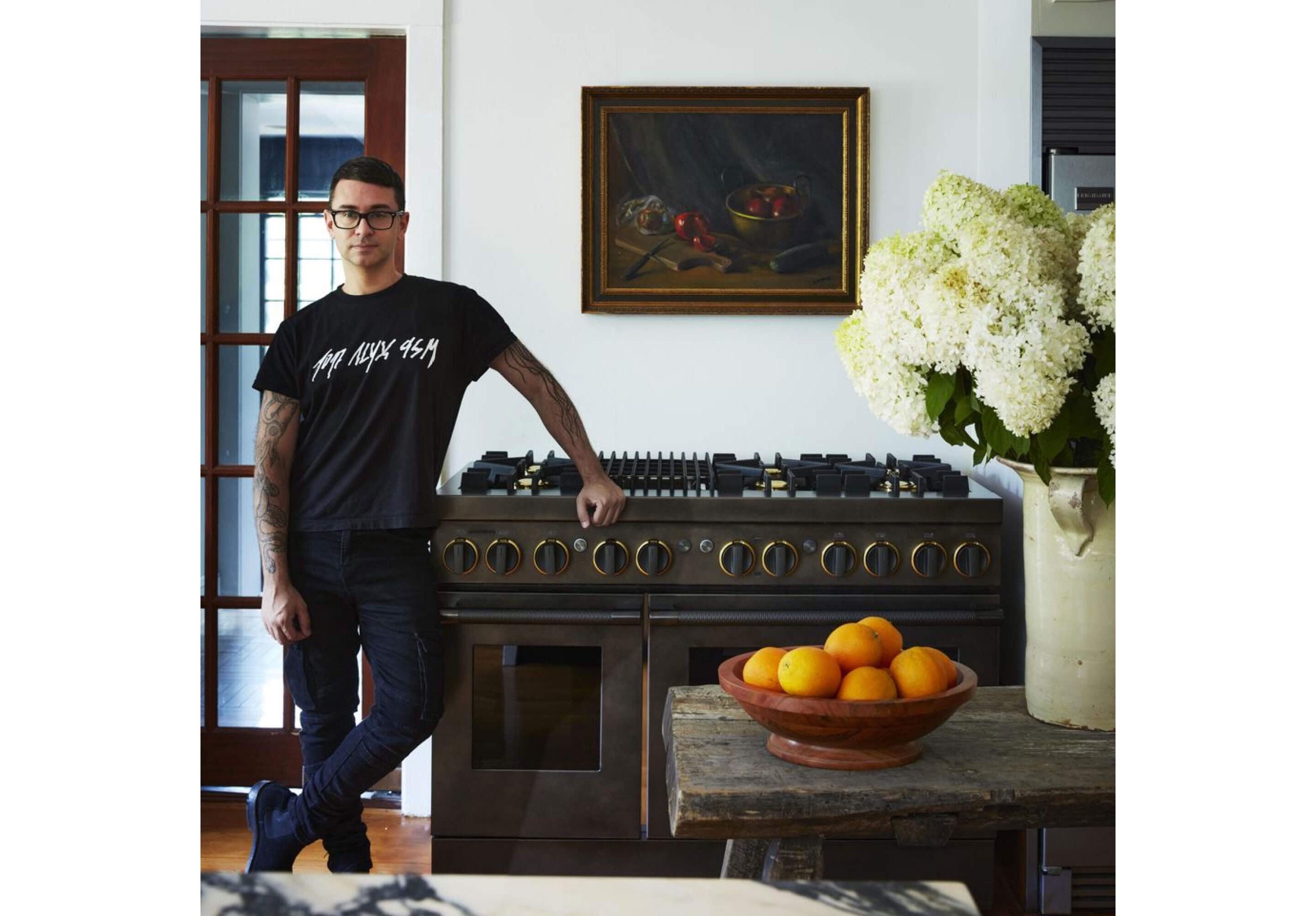 Christian Siriano with the JennAir® Smoke & Brass Range.