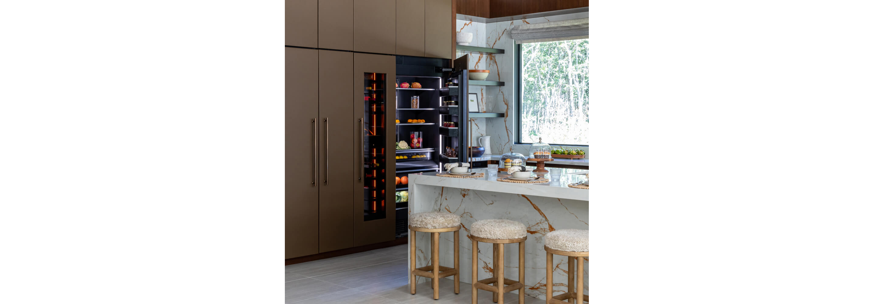 A luxury kitchen featuring JennAir appliances.