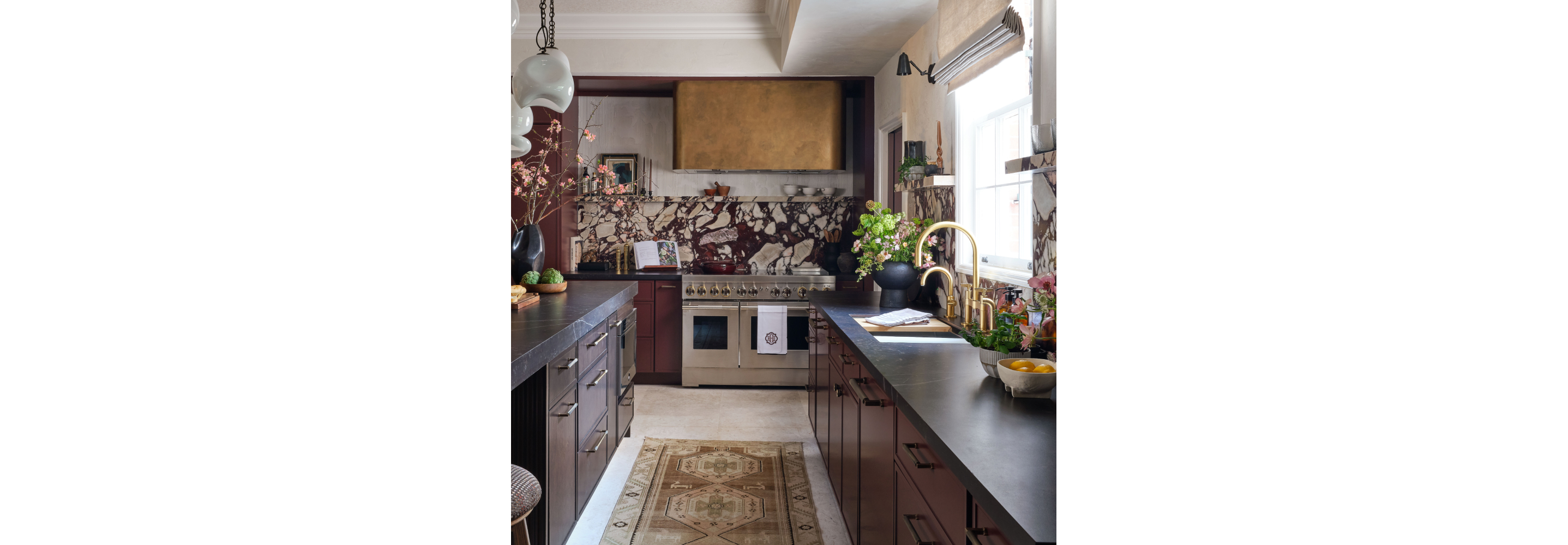 A bold, modern kitchen design featuring JennAir appliances.