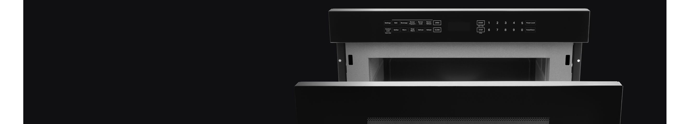 A JennAir® Built-In Microwave with the door partially open.
