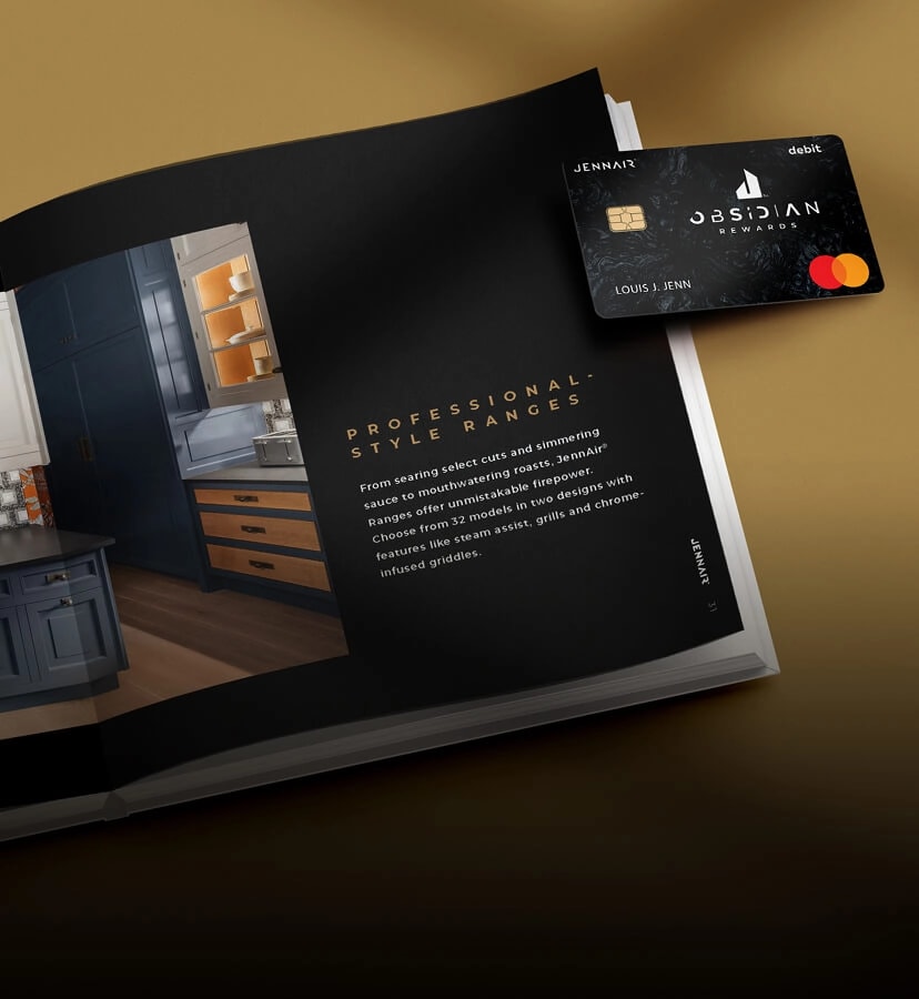 An open page of the Obsidian Rewards booklet and an Obsidian rewards Mastercard.