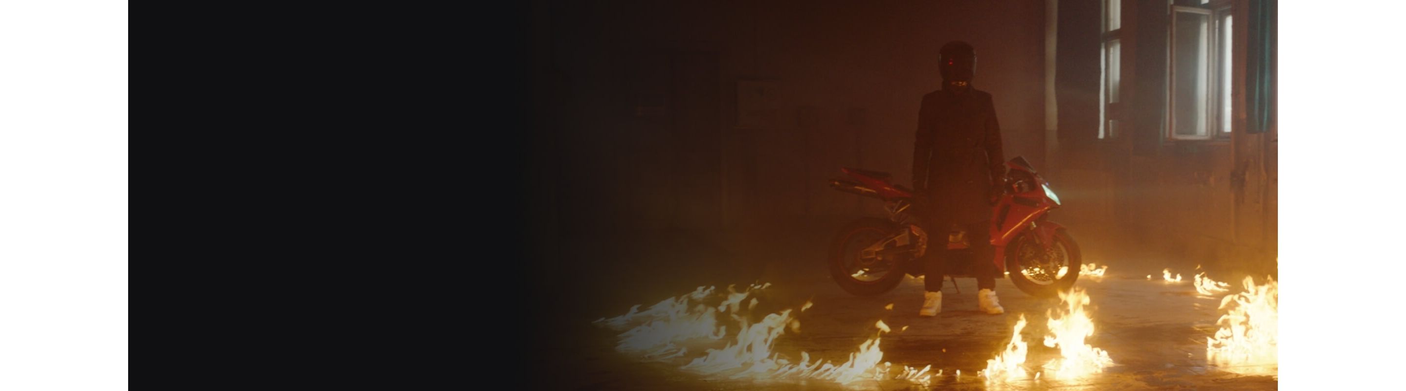 A dancing woman surrounded by pink smoke.
