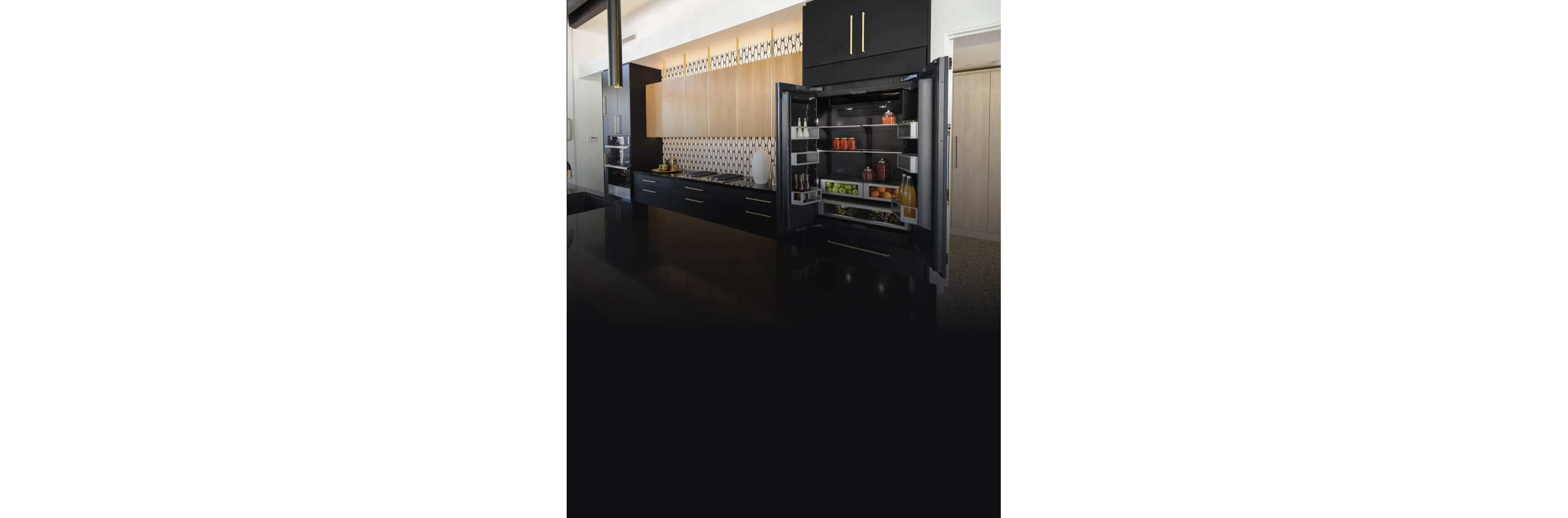 An open JennAir Built-In Refrigerator in.a kitchen.