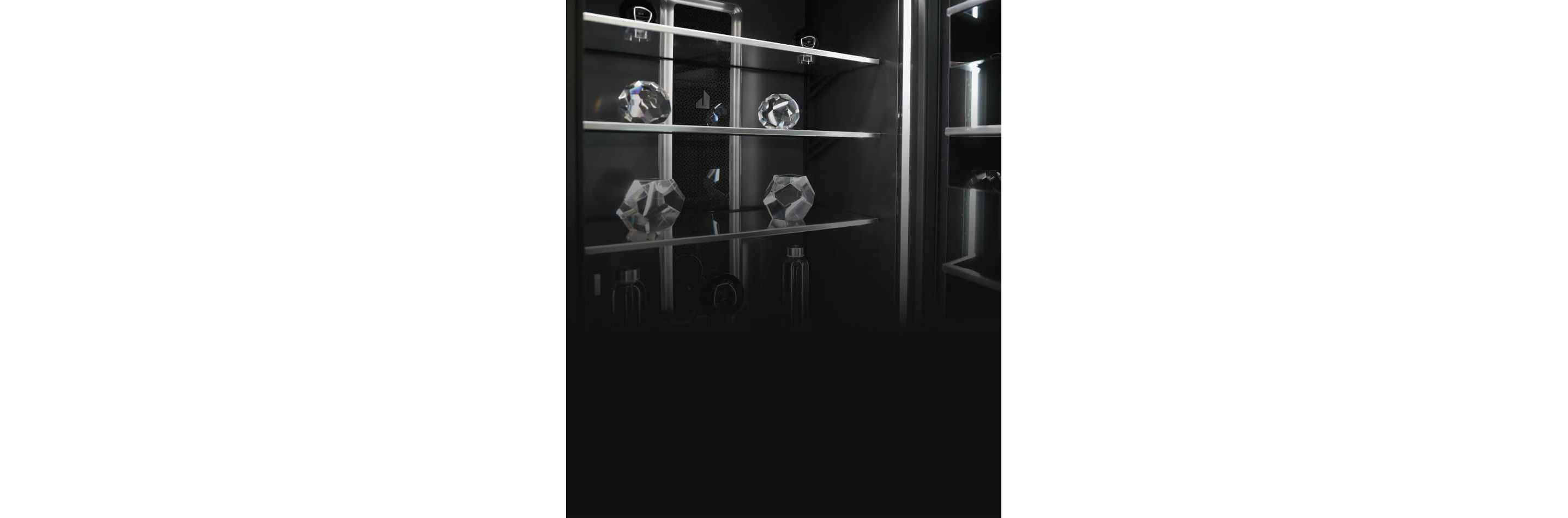 The interior of a JennAir Column, filled with glass and crystal objects.