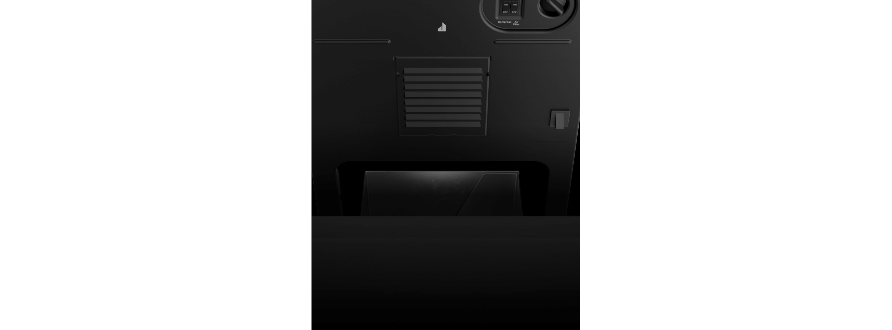 The interior of a JennAir® compactor, showing the location of the filter.