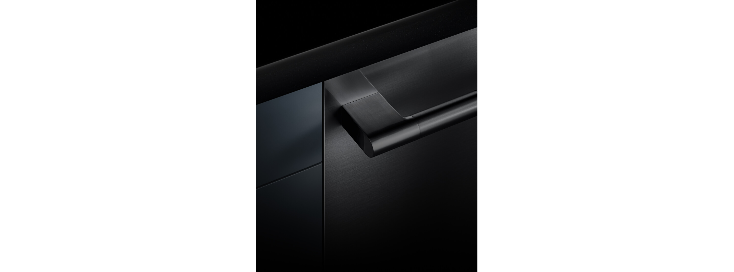 The front of a dishwasher, showing the flush and fully integrated design against the cabinetry.