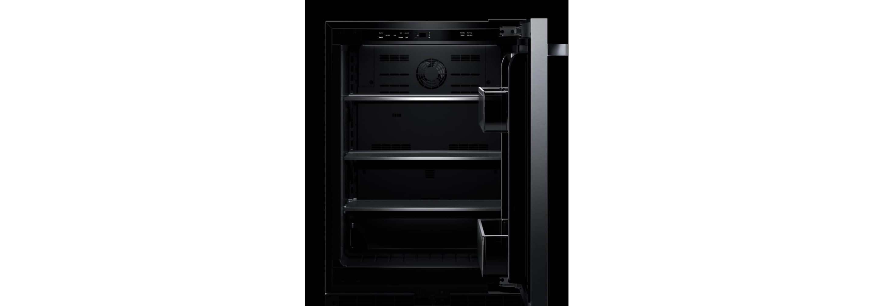 The interior of an undercounter refrigerator displaying the rich Obsidian black interior.