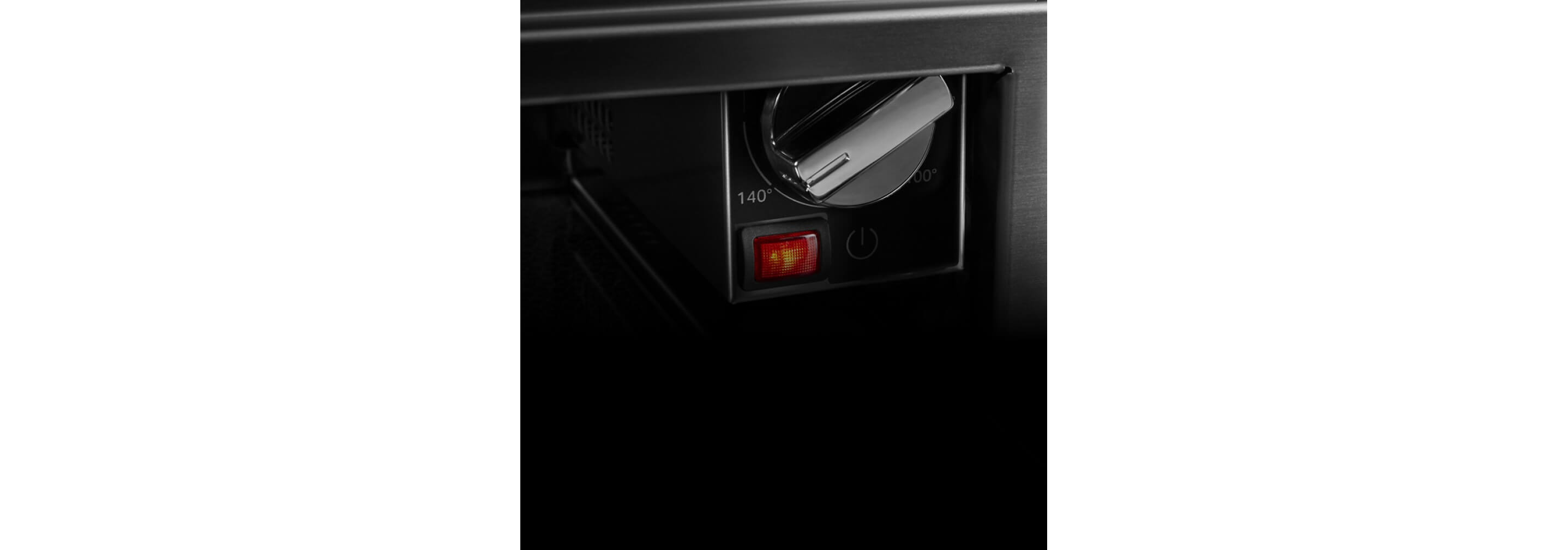 The controls inside of the warming drawer.