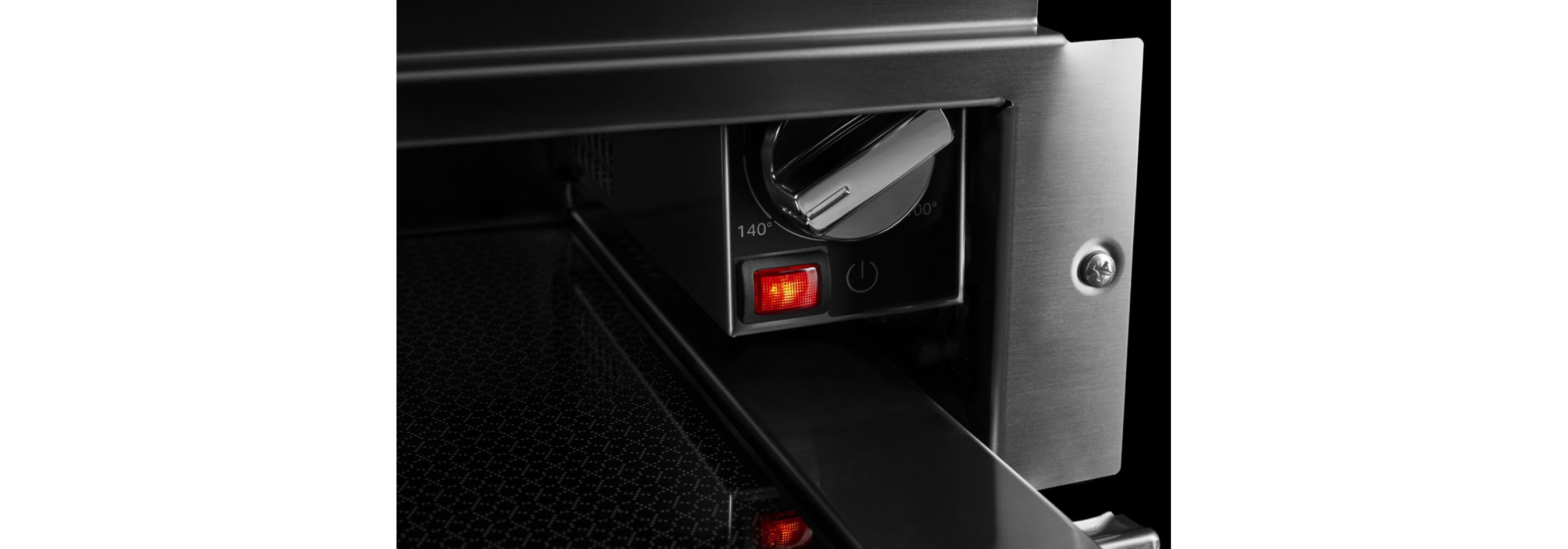 The temperature control knob in a JennAir® warming drawer.